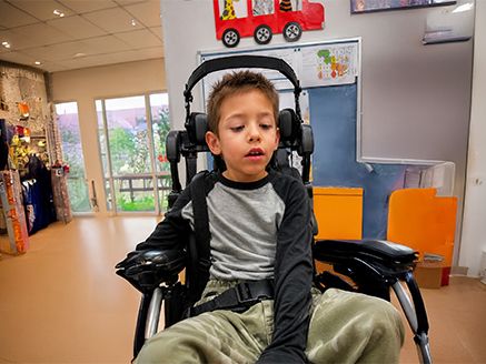 A child supported by the 360 system